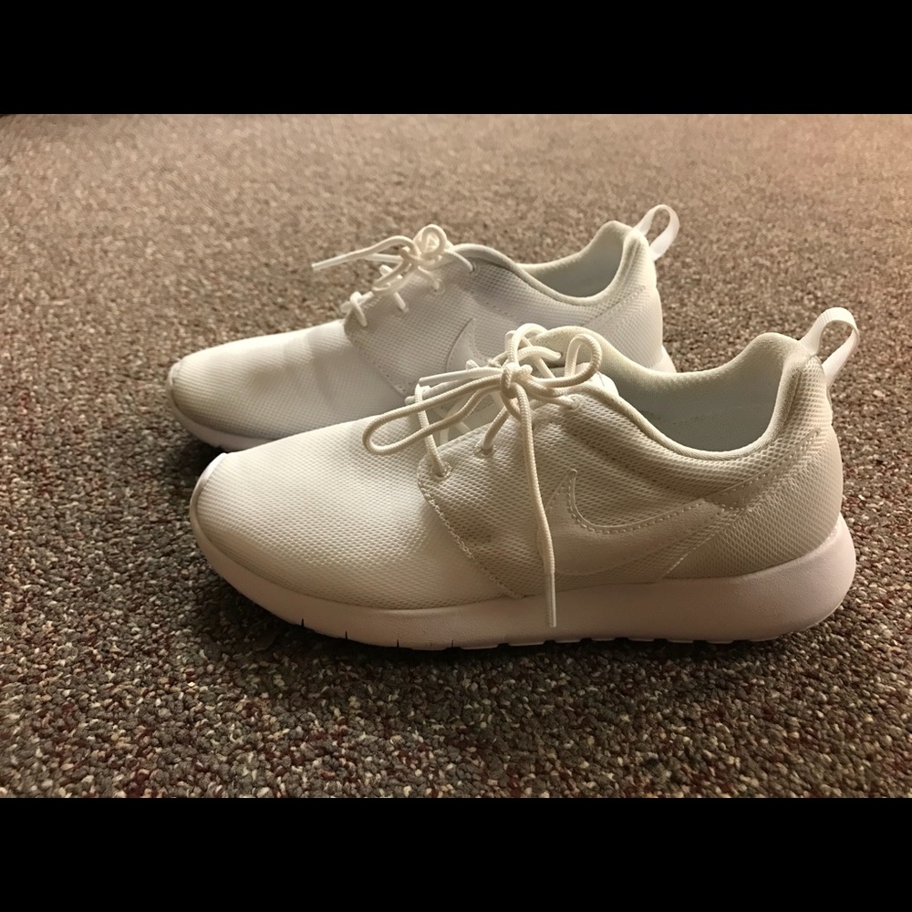 Nike white running shoes